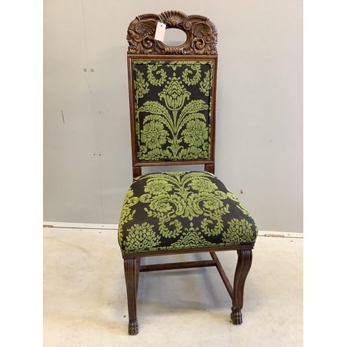 17 - A pair of Victorian carved oak dining chairs, height 110cm. Condition - good