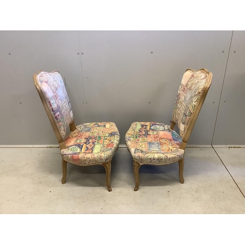23 - A pair of French painted beech salon chairs, width 52cm, height 80cm. Condition - fair