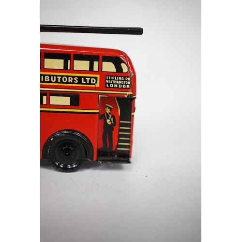 379 - A boxed Wells Brimtoy tinplate clockwork trolley bus loosely in London Transport livery, together wi... 