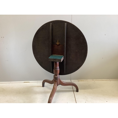 45 - An early 19th century circular mahogany tilt top tripod tea table, diameter 86cm, height 67cm. Condi... 
