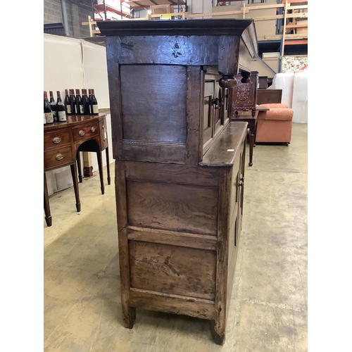 54 - An 18th century oak Duodarn, width 143cm, depth 55cm, height 152cm. Condition - fair