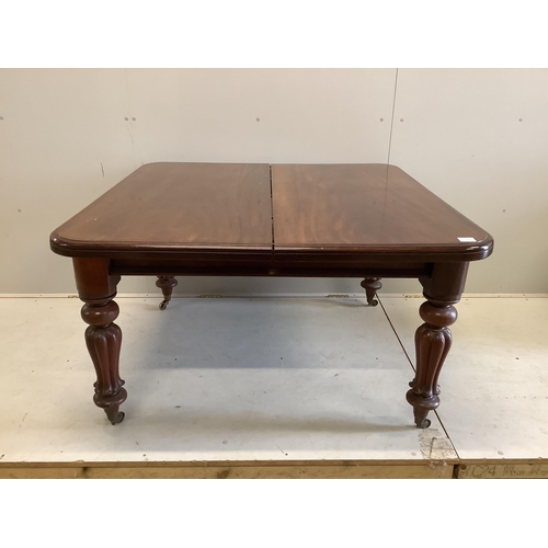 61 - A Victorian mahogany extending dining table, width 238cm extended, two spare leaves, depth 120cm, he... 