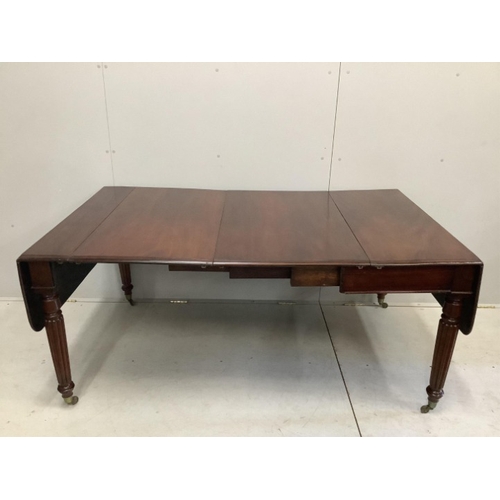 105 - A George IV mahogany drop flap extending dining table, width 228cm extended, two spare leaves, depth... 