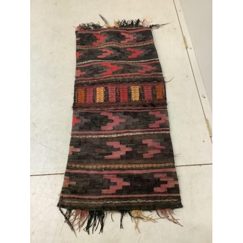 108 - An Afghan flatweave salt bag, a double saddle bag and one other bag, largest approximately 120 x 80c... 