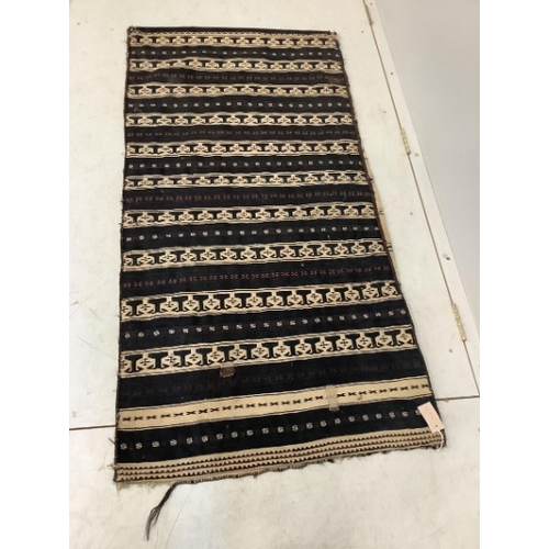 108 - An Afghan flatweave salt bag, a double saddle bag and one other bag, largest approximately 120 x 80c... 