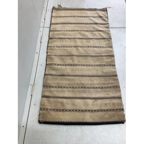 108 - An Afghan flatweave salt bag, a double saddle bag and one other bag, largest approximately 120 x 80c... 