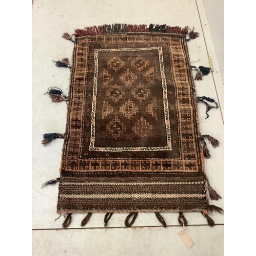 108 - An Afghan flatweave salt bag, a double saddle bag and one other bag, largest approximately 120 x 80c... 