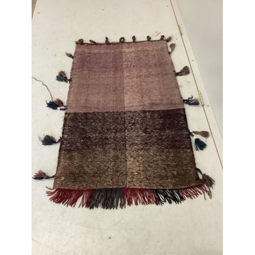 108 - An Afghan flatweave salt bag, a double saddle bag and one other bag, largest approximately 120 x 80c... 