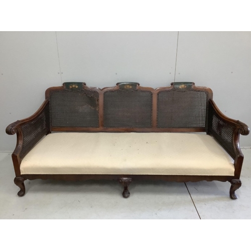 110 - An early 20th century part painted walnut three piece bergere suite, settee width 186cm, depth 78cm,... 