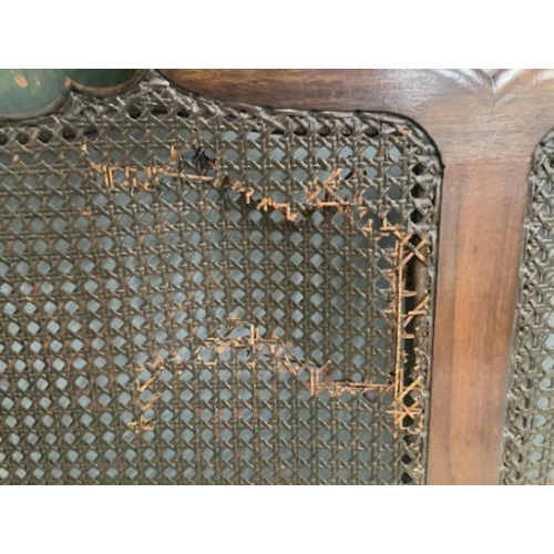 110 - An early 20th century part painted walnut three piece bergere suite, settee width 186cm, depth 78cm,... 