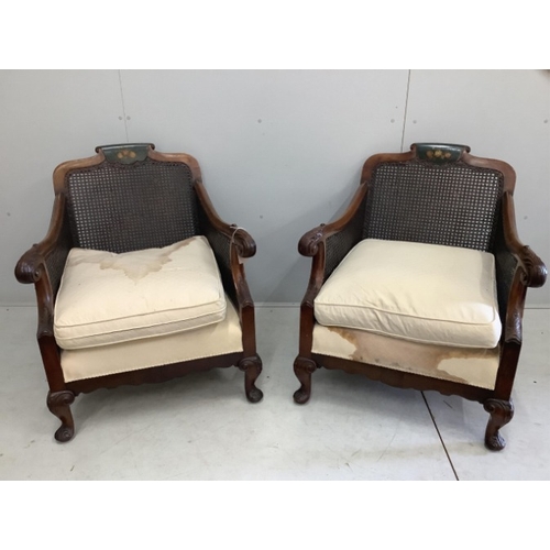 110 - An early 20th century part painted walnut three piece bergere suite, settee width 186cm, depth 78cm,... 