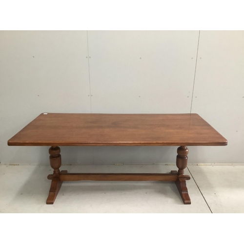 111 - An 18th century style rectangular oak refectory dining table, width 182cm, depth 83cm, height 71cm t... 