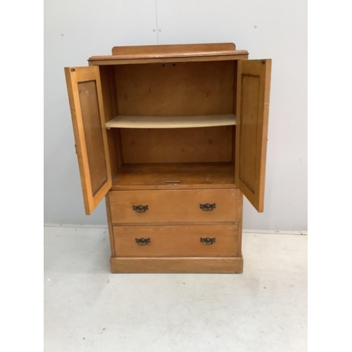 114 - An early 20th century small oak press cupboard, width 75cm, depth 42cm, height 124cm
