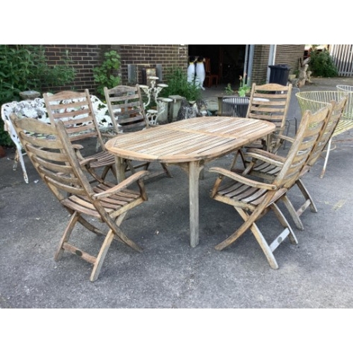 28 - A weathered slatted teak Nova extending garden table, width 240cm extended, depth 100cm, height 71cm... 