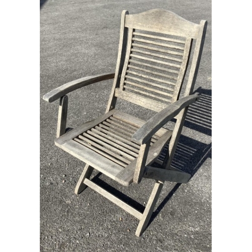 63 - Six teak folding garden chairs by Firman and three others