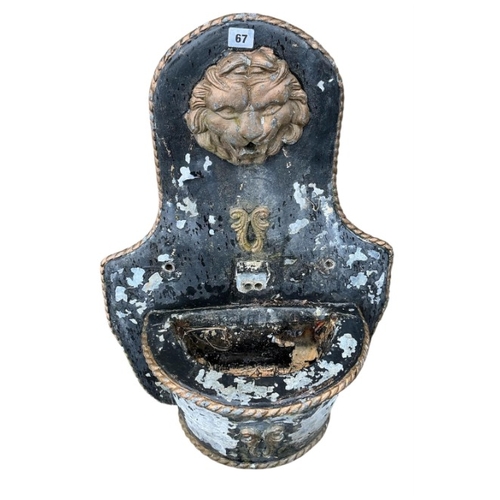 67 - A reconstituted stone recumbent lion and ram garden ornament, length 60cm, together with a painted c... 