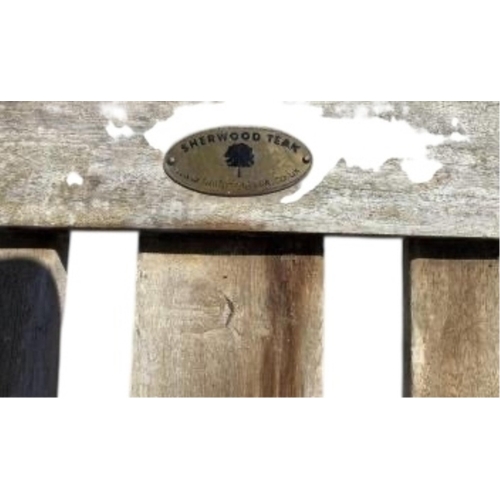 75 - Six Sherwood teak elbow chairs, a weathered teak oval extending garden table, 181cm extended, depth ... 