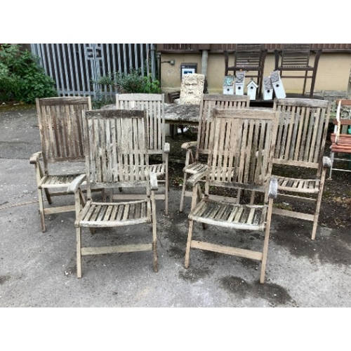 79 - A weathered teak oval extending garden table, width 239cm extended, depth 109cm, height 73cm togethe... 