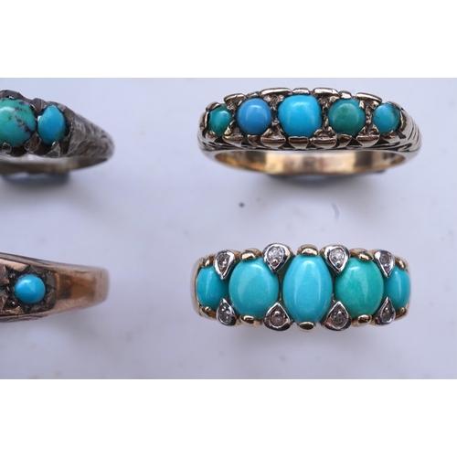 A group of four turquoise rings, each set with turquoise cabochons, one ...