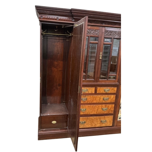 108 - A late Victorian carved mahogany mirrored wardrobe, width 208cm, depth 60cm, height 218cm