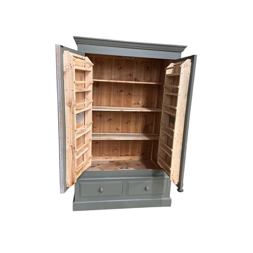 113 - A painted pine larder cupboard, width 124cm, depth 92cm, height 200cm