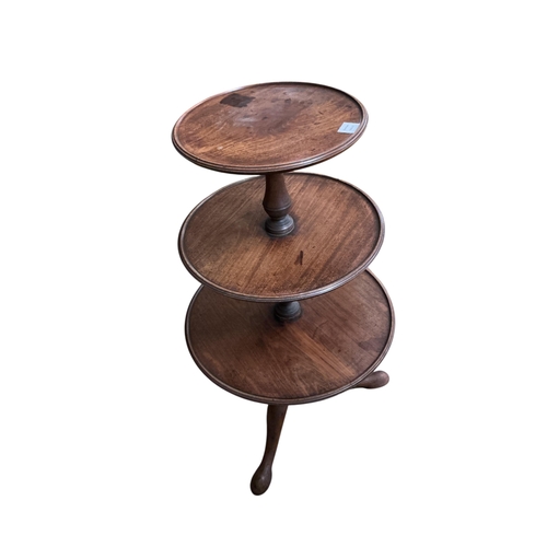 74 - A George III mahogany three tier whatnot, height 106cm