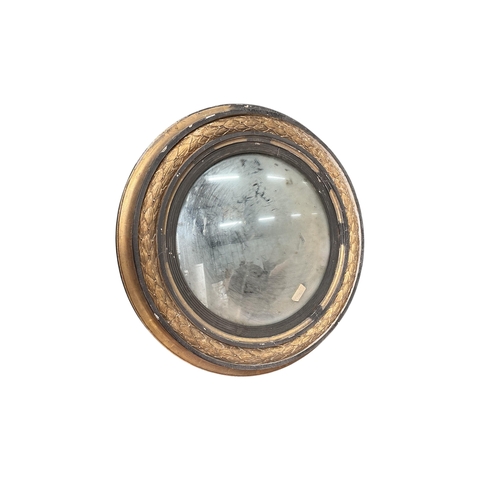 2003 - A Regency giltwood and composition circular convex wall mirror, in need of restoration, diameter 70c... 