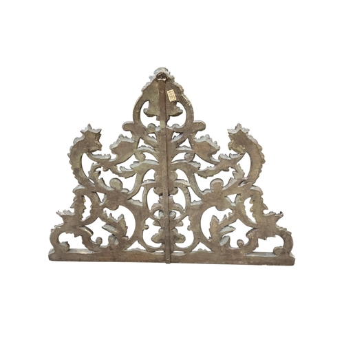 2022 - An early 20th century carved giltwood pediment, width 108cm, height 82cm