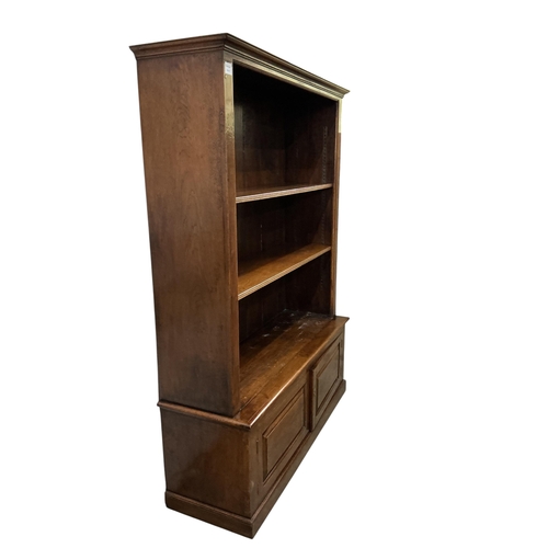 2024 - An reproduction oak open bookcase / cupboard, width 128cm, depth 41cm, height 172cm