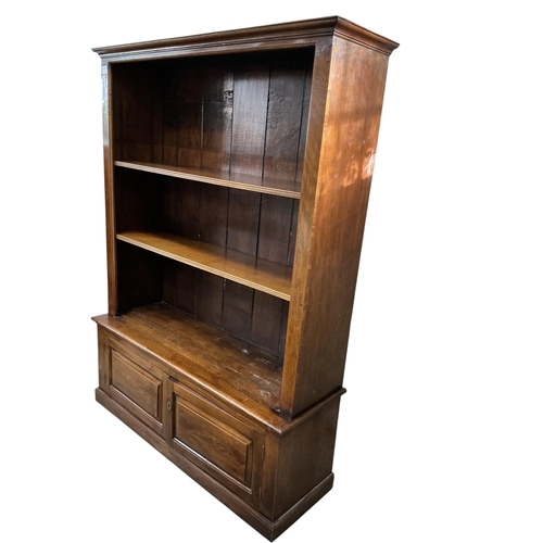 2024 - An reproduction oak open bookcase / cupboard, width 128cm, depth 41cm, height 172cm