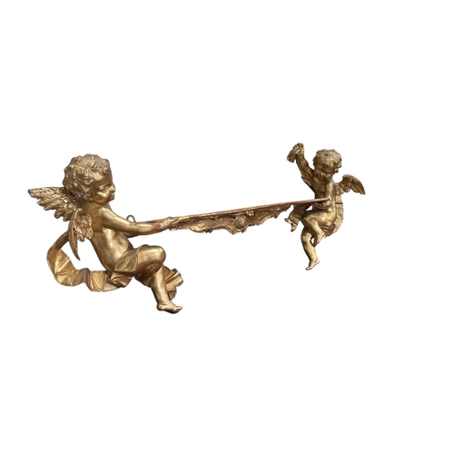 2026 - A Victorian style giltwood and composition cherub wall bracket, width 102cm, height 38cm