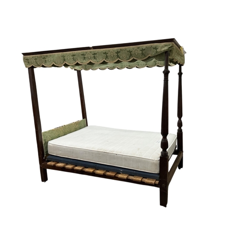 2028 - A George III and later oak and mahogany four poster bed, width 136cm, length 212cm, height 212cm.... 