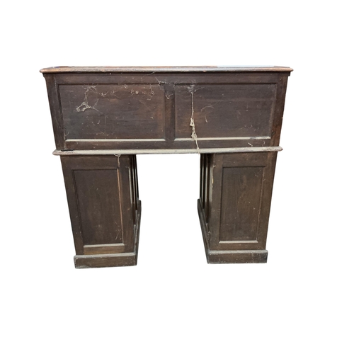 2035 - An early 20th century oak 'S' shaped tambour roll top desk, width 124cm, depth 78cm, height 120cm... 