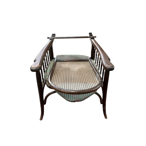2042 - An early 20th century Fischel caned bentwood reclining armchair, width 64cm, depth 86cm, height 107c... 