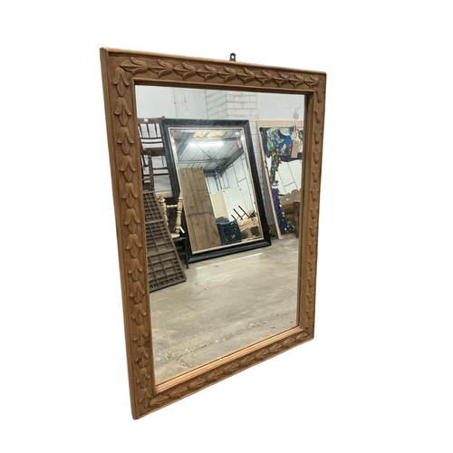 2059 - A rectangular carved pine overmantel mirror, width 122cm, height 92cm