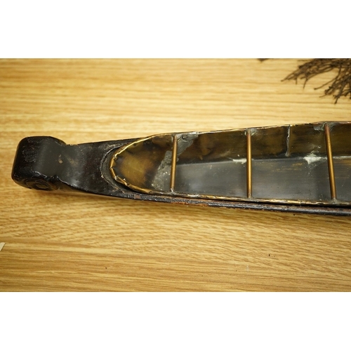 2459 - A Chinese export lacquer model of a boat, 19th century, 56cm wide