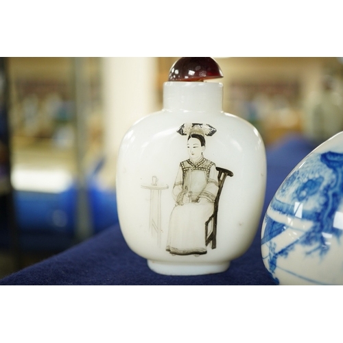 2464 - A Chinese enamelled white glass snuff bottle, a blue and white bird feeder and a famille rose vase, ... 