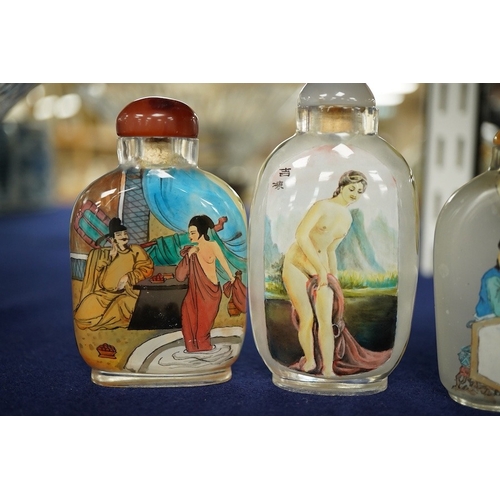 2467 - Four Chinese inside painted glass snuff bottles, tallest 9cm