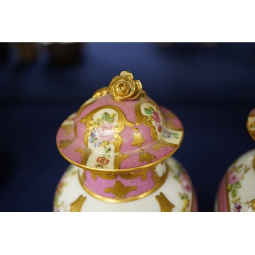 2475 - A pair of 19th century Sevres style vases and covers, marked rubbed, 15cm