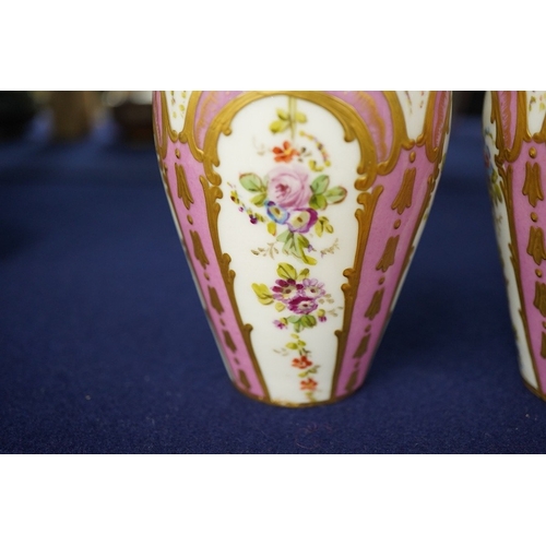 2475 - A pair of 19th century Sevres style vases and covers, marked rubbed, 15cm