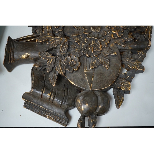 2494 - A folk art partially gilt carved panel, 50cm high