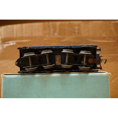 254 - A collection of Hornby Dublo railway for 3-rail running, including three boxed locomotives; an LNER ... 