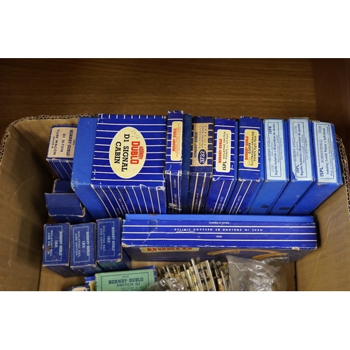 254 - A collection of Hornby Dublo railway for 3-rail running, including three boxed locomotives; an LNER ... 