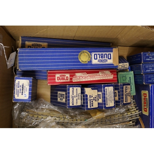 254 - A collection of Hornby Dublo railway for 3-rail running, including three boxed locomotives; an LNER ... 