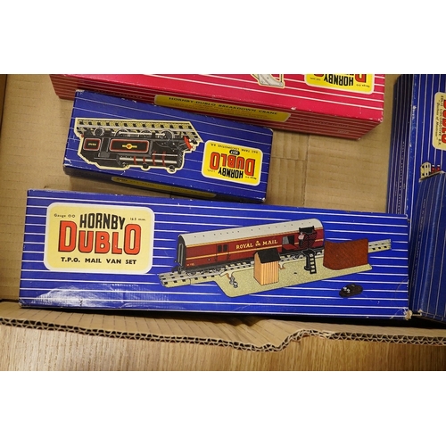 254 - A collection of Hornby Dublo railway for 3-rail running, including three boxed locomotives; an LNER ... 