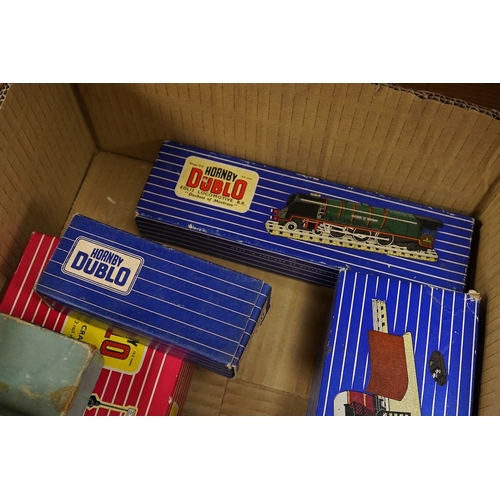 254 - A collection of Hornby Dublo railway for 3-rail running, including three boxed locomotives; an LNER ... 