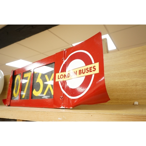 374 - A London Transport bus destination blind box, complete with mechanism and three numerical destinatio... 