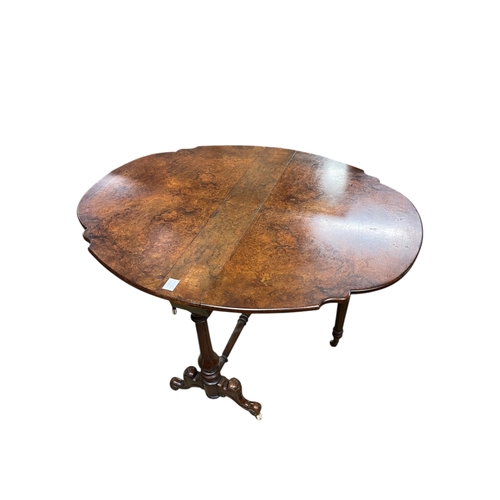 62 - A Victorian walnut Sutherland table, width 92cm, height 68cm