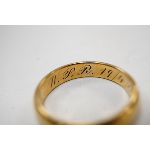 A Far Eastern yellow metal wedding band with engraved inscription ...