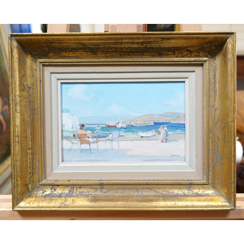 33 - § Georgios Kosmadopoulos  (Greek, 1895-1967)A Greek coastal scene with a figure relaxing to the fore... 